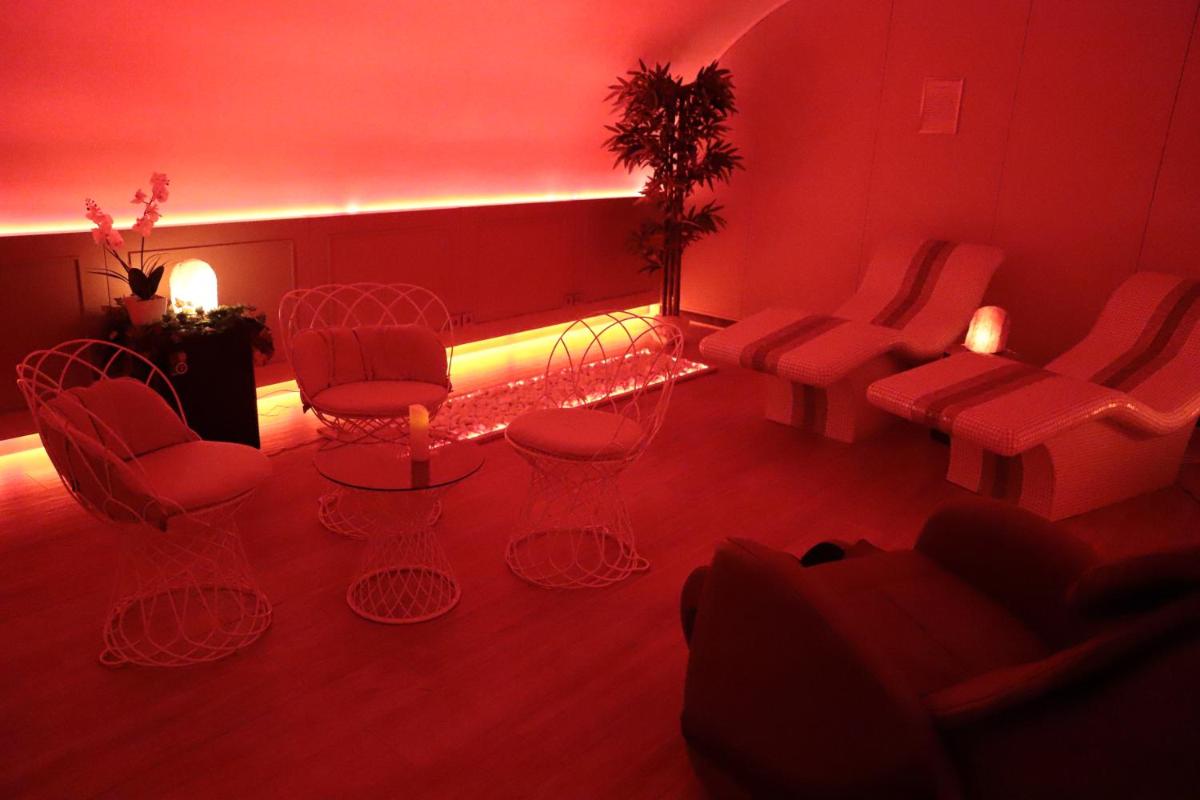 Coin salon dans l'établissement Hôtel Brésil Opéra SPA