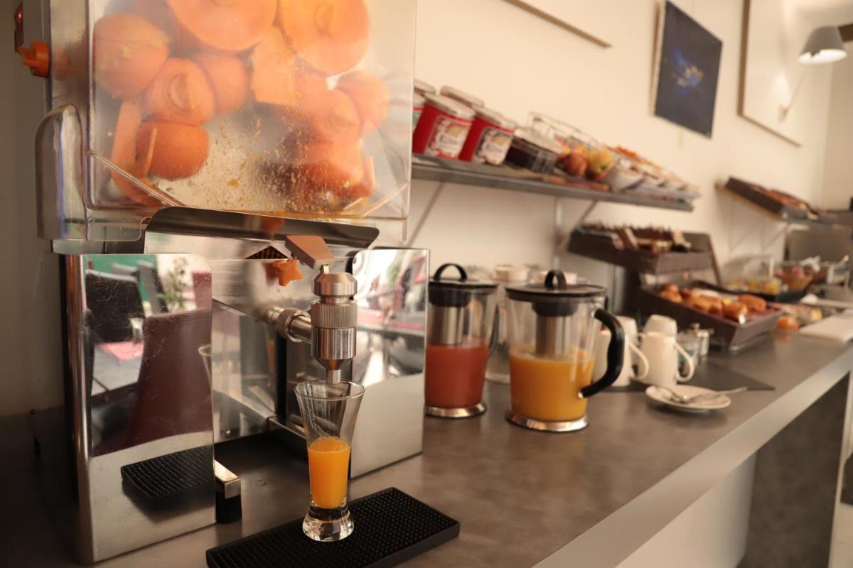 Cuisine ou kitchenette dans l'établissement Hôtel Brésil Opéra SPA