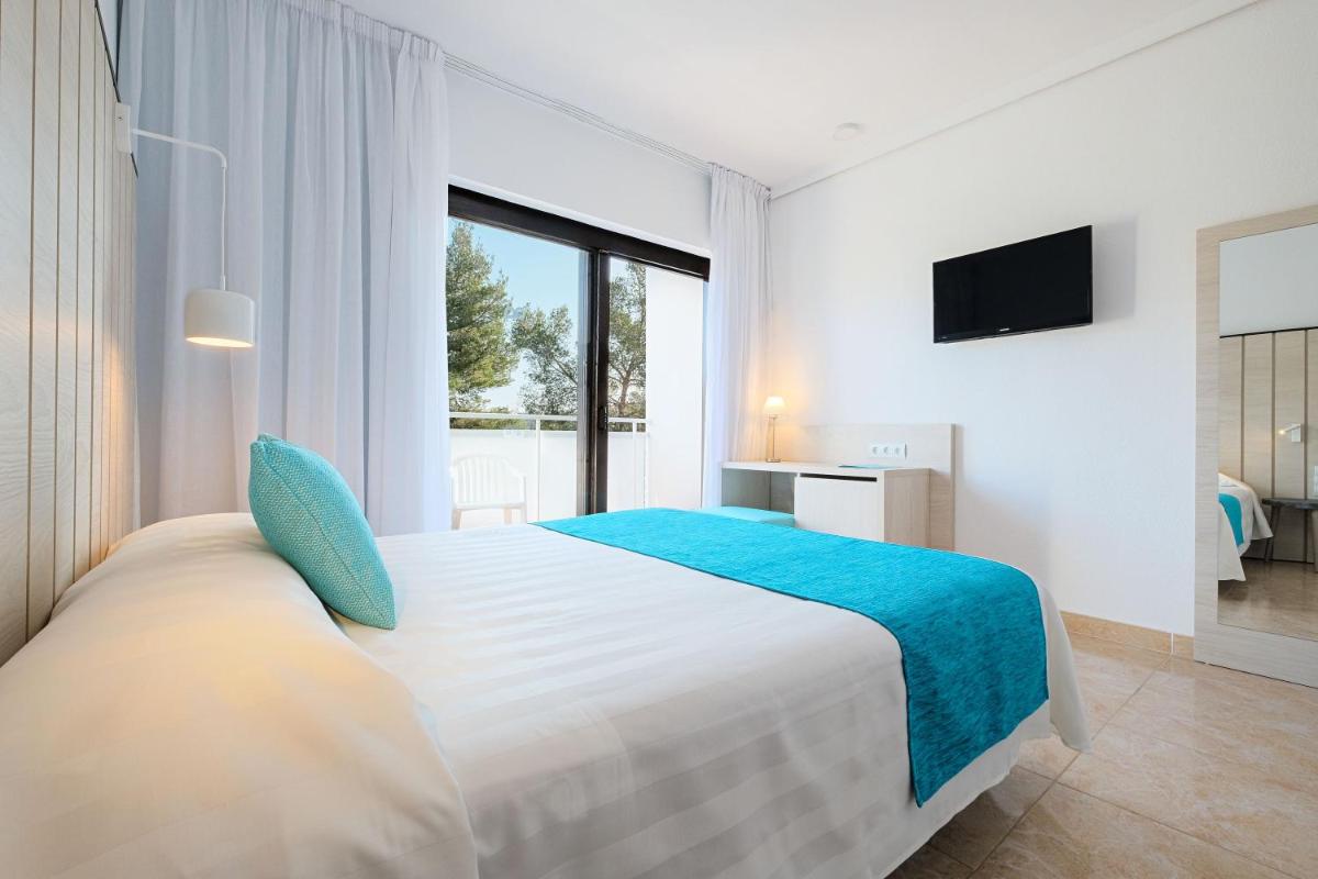 Cama o camas de una habitación en azuLine Hotel Bergantin