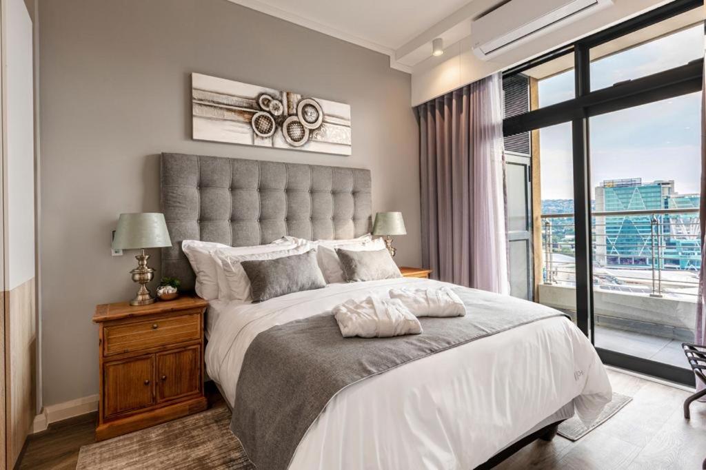 Menlyn Maine Residence Unit 1419 - Housity