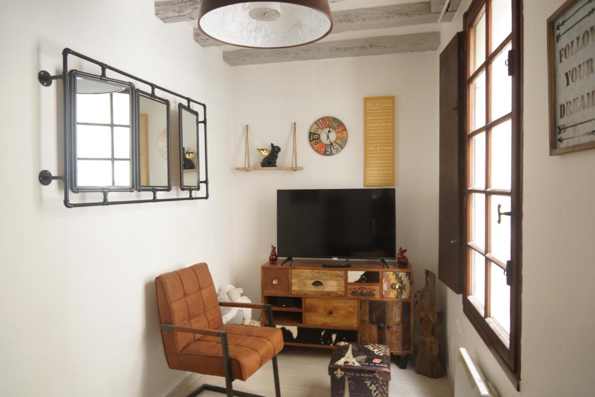 Maisonnette atypique en triplex au calme hyper-centre place du Ralliement - Housity