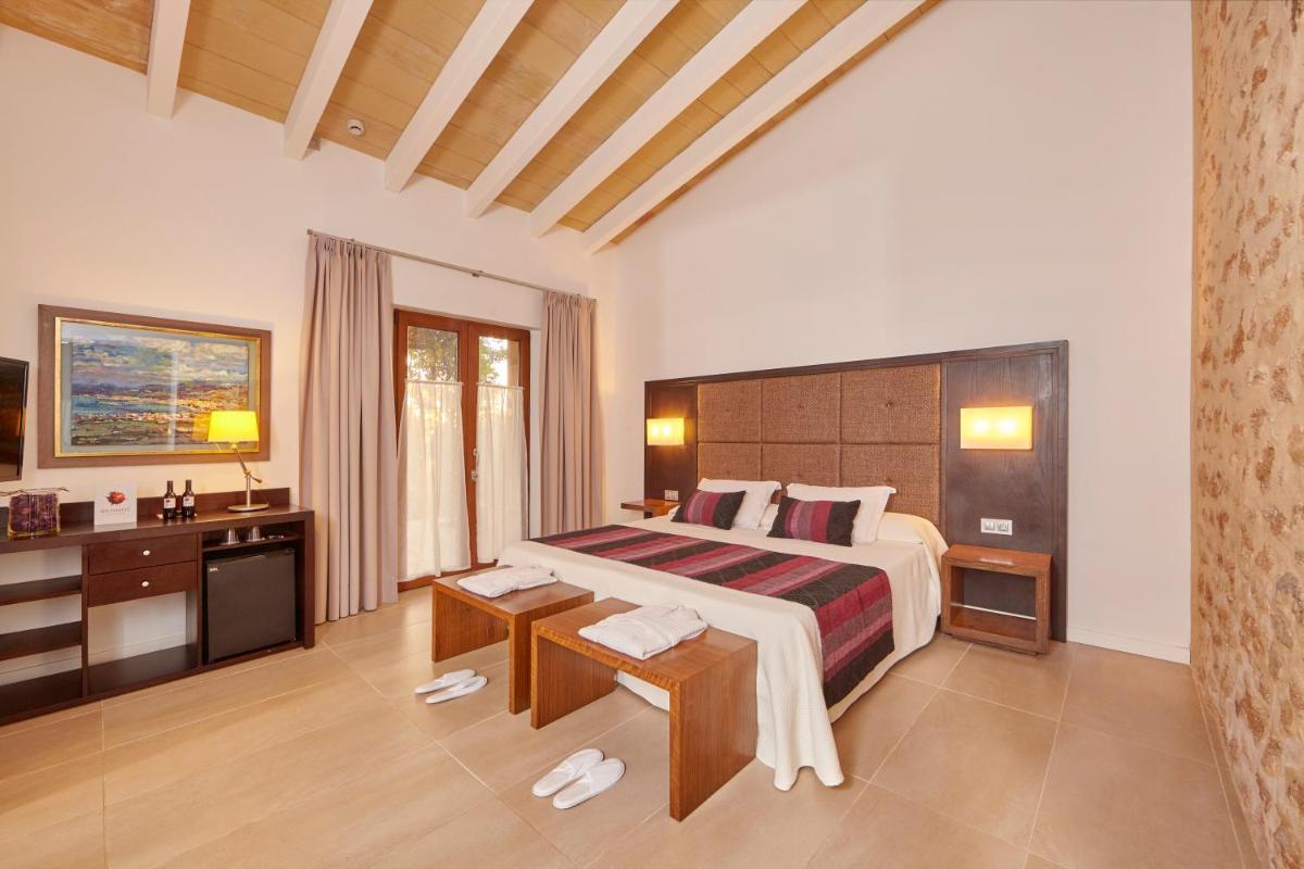 Cama o camas de una habitación en Bennoc Petit Hotel - Only Adults