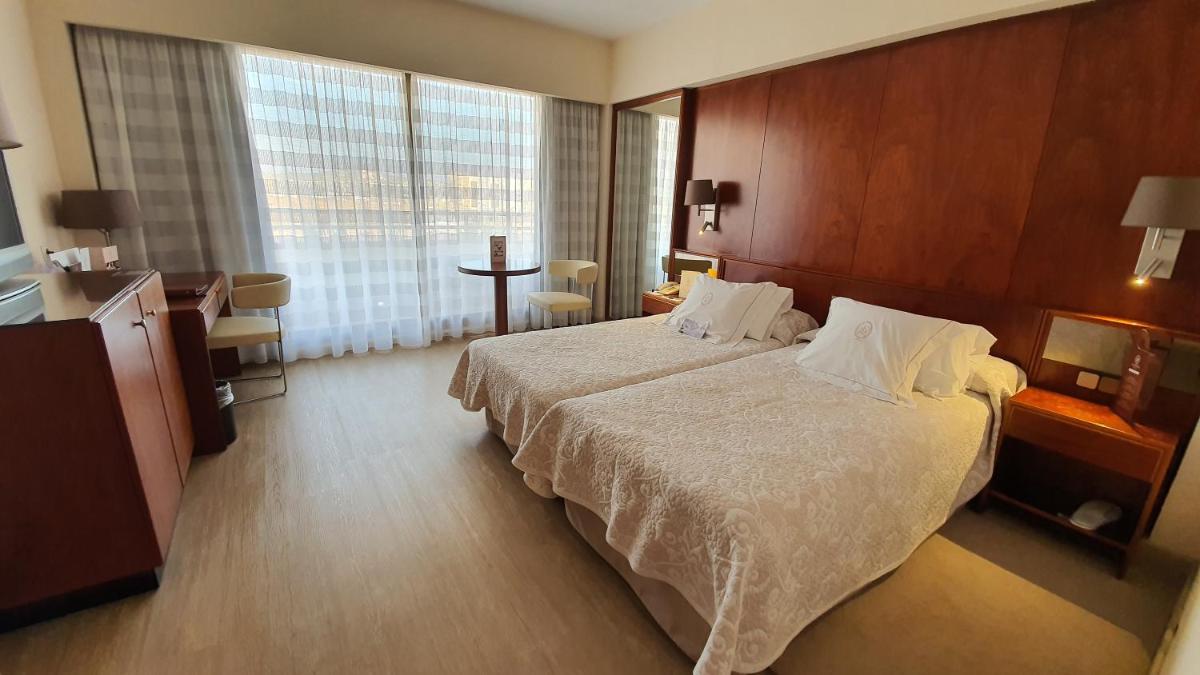 Cama o camas de una habitación en Hotel Royal Plaza