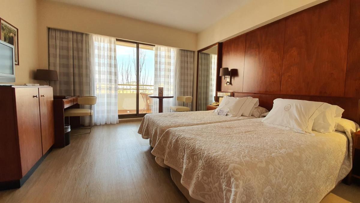 Cama o camas de una habitación en Hotel Royal Plaza