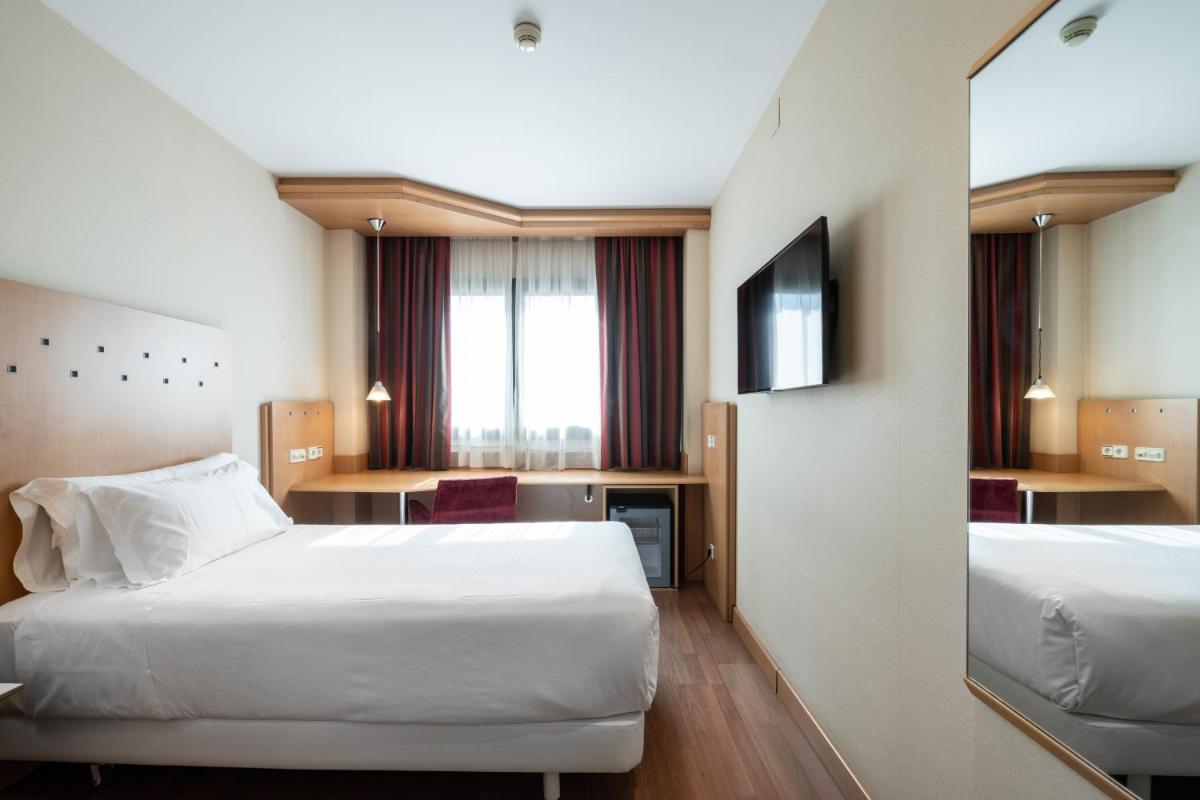 Cama o camas de una habitación en Catalonia La Maquinista