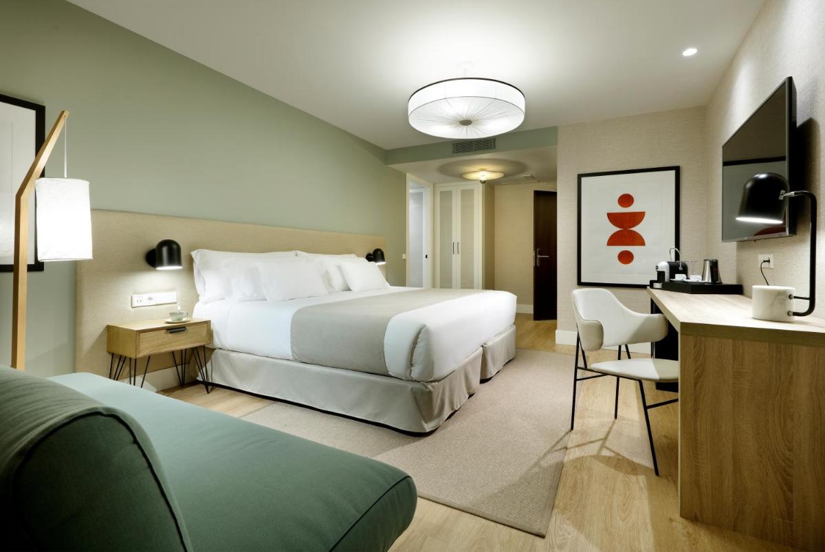 Cama o camas de una habitación en Barceló Oviedo Cervantes
