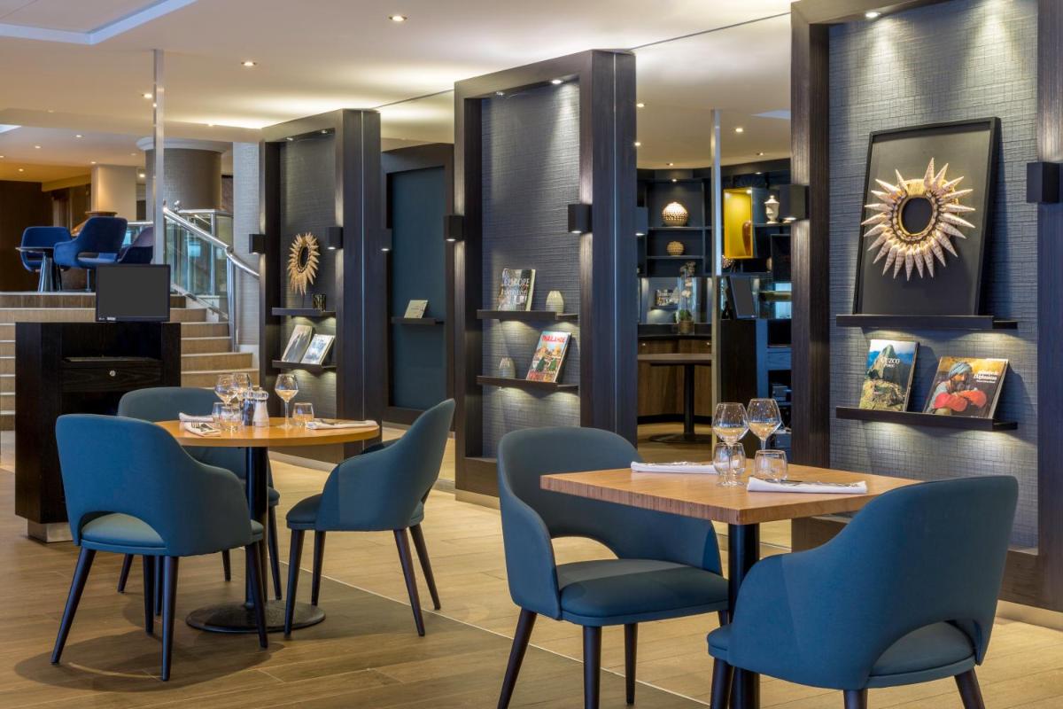 Coin salon dans l'établissement Best Western Plus Hotel Admiral