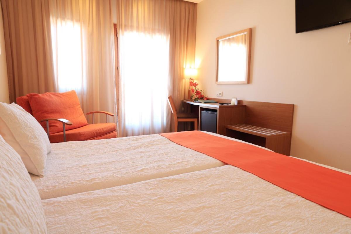 Cama o camas de una habitación en Hotel Monarque Costa Narejos