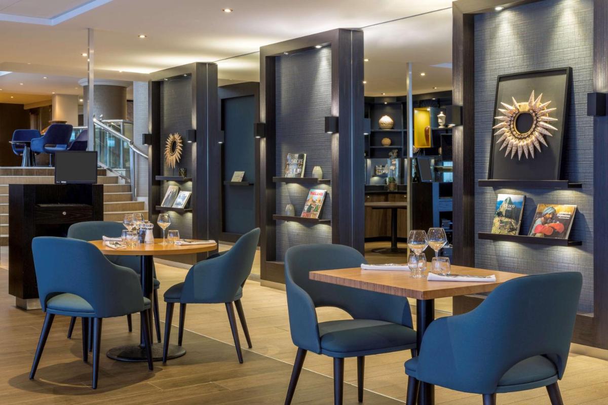 Coin salon dans l'établissement Best Western Plus Hotel Admiral
