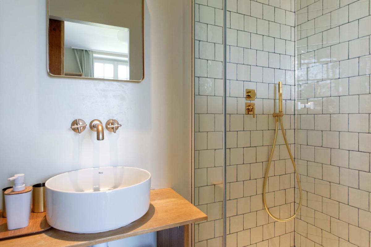 Salle de bains dans l'établissement Ty Mad