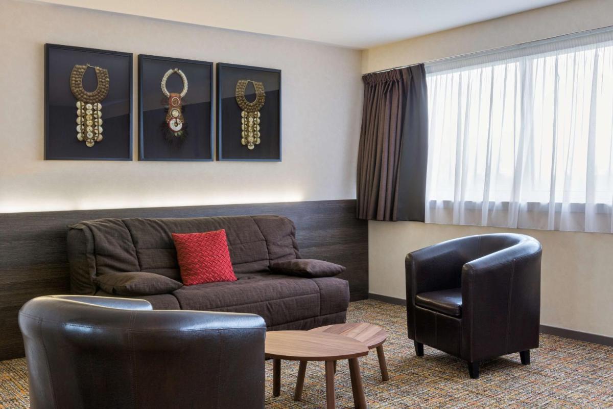 Coin salon dans l'établissement Best Western Plus Hotel Admiral