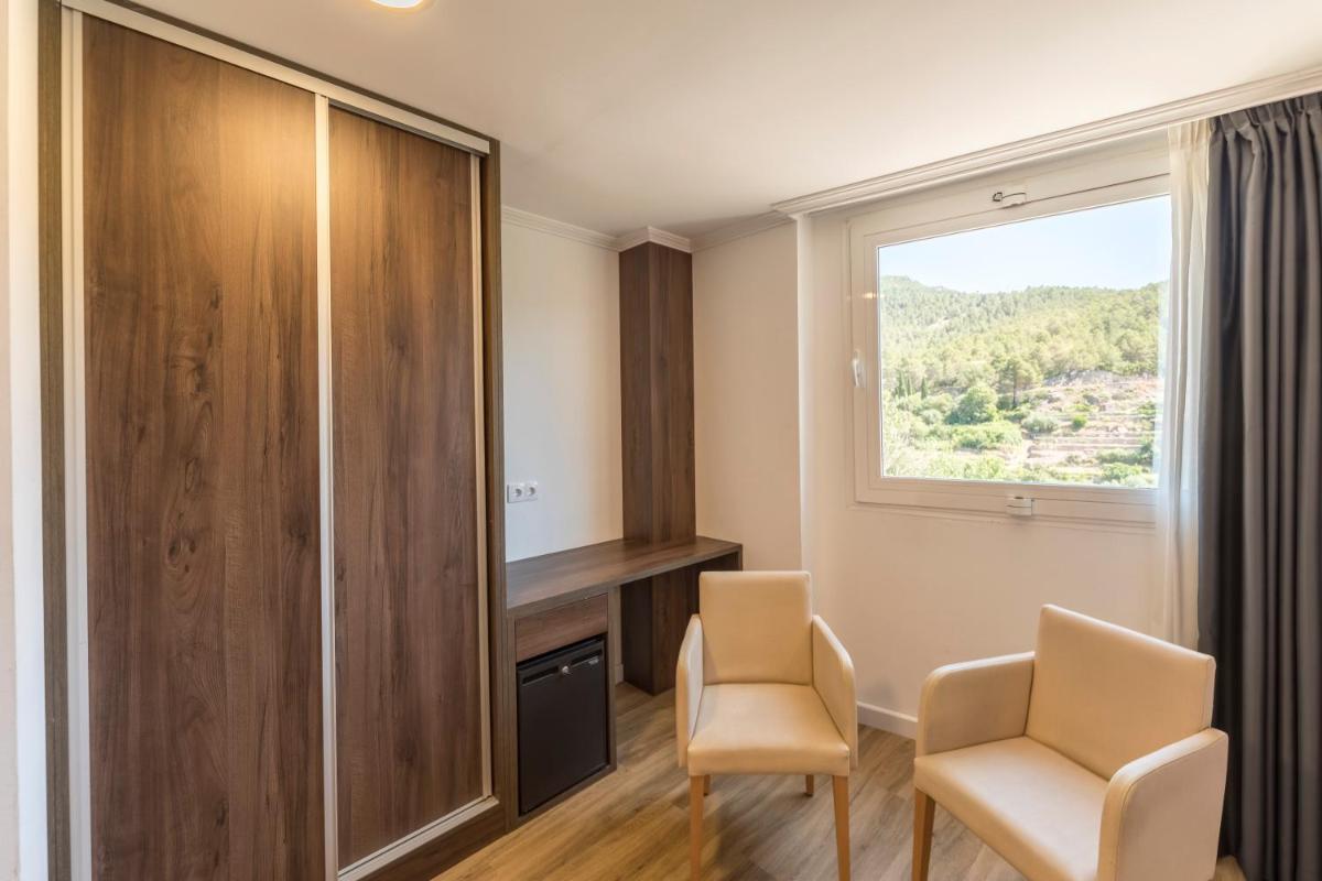Zona de estar de Hotel Rosaleda del Mijares