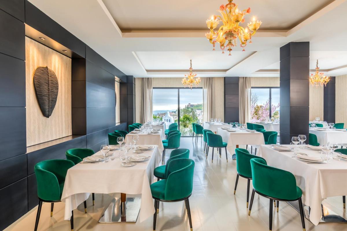 Un restaurante o sitio para comer en Barceló Aracena & Spa