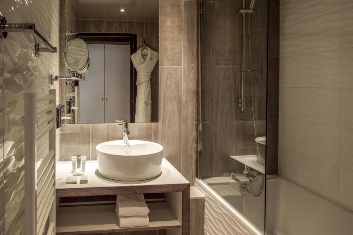 Salle de bains dans l'établissement Le Pic Blanc