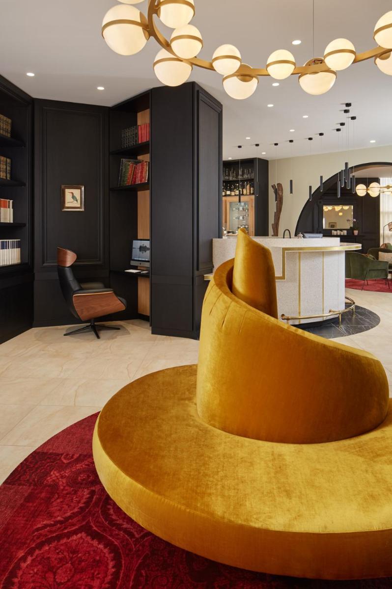 Coin salon dans l'établissement Les Nomades Beaune