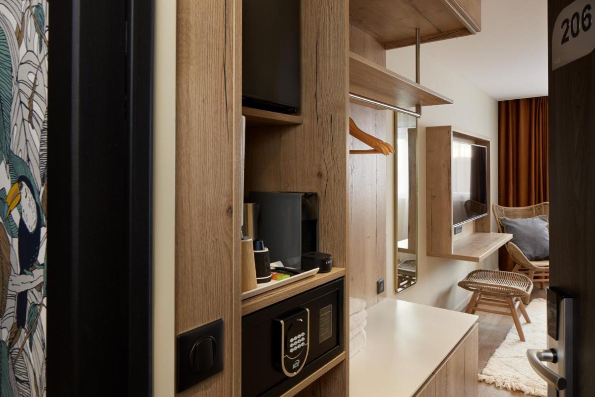 Cuisine ou kitchenette dans l'établissement Les Nomades Beaune