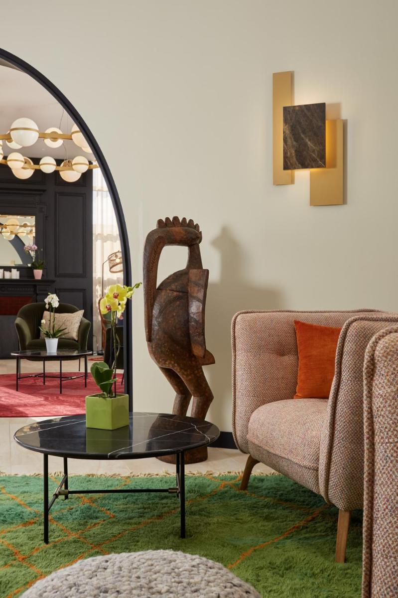 Coin salon dans l'établissement Les Nomades Beaune