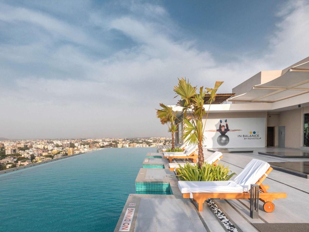 a view from the infinity pool of a villa at Novotel Vijayawada Varun in Vijayawāda