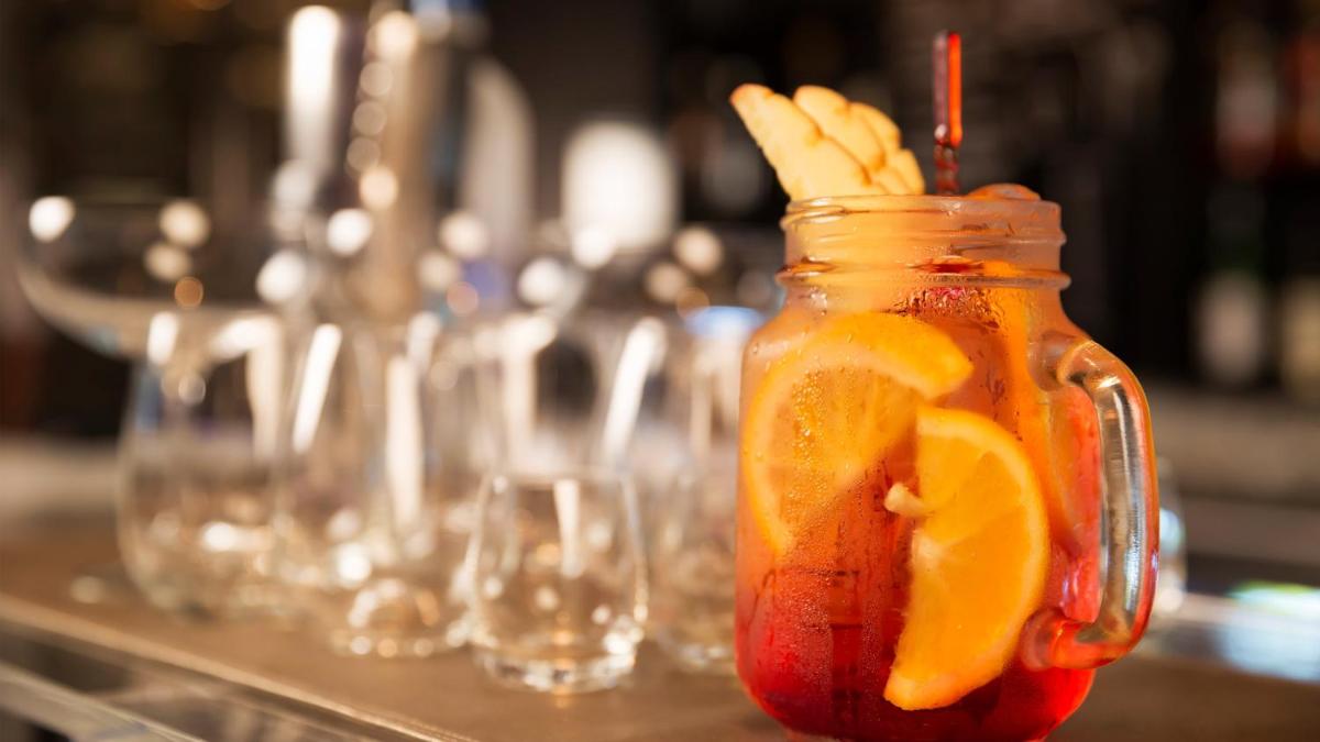 a mason jar filled with fruit and lemon slices at InterContinental Marine Drive Mumbai by IHG in Mumbai