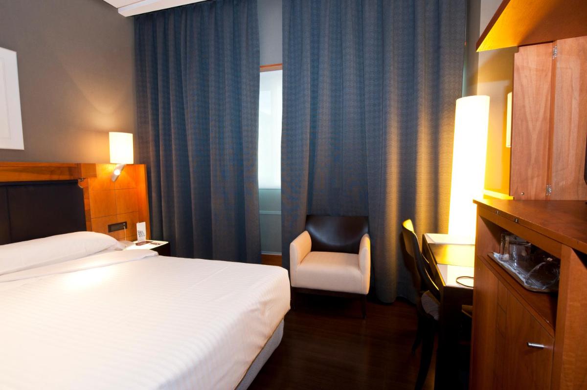 Cama o camas de una habitación en Gran Hotel Lakua