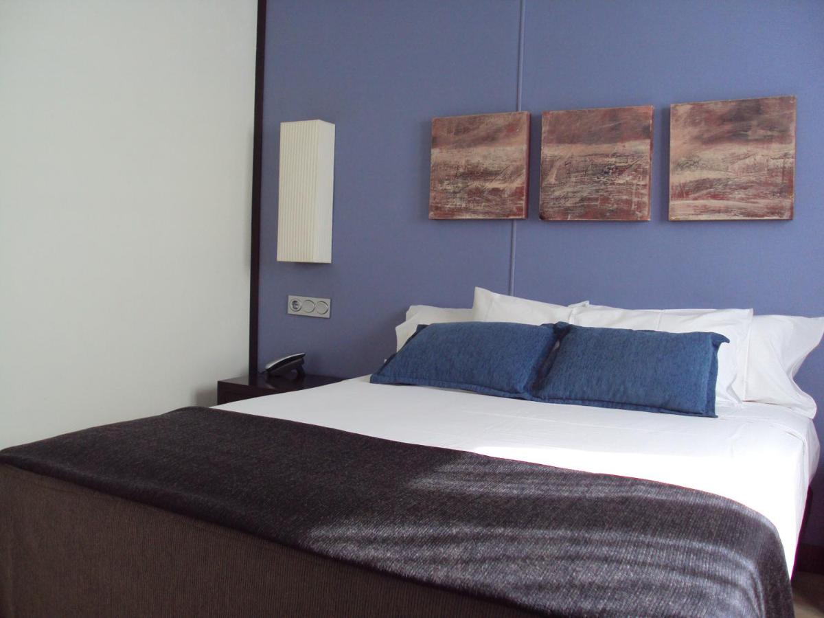 Hotel Puerta de Ocaña - Housity
