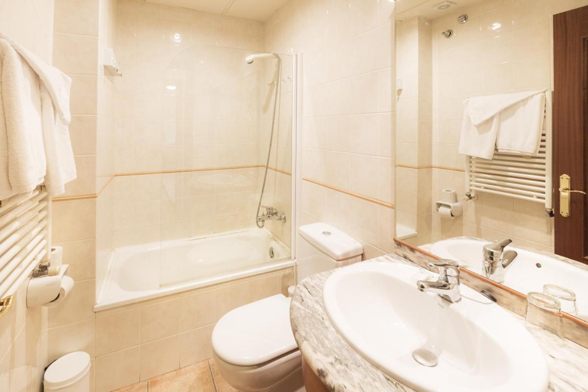 Un baño de Aparthotel Trainera