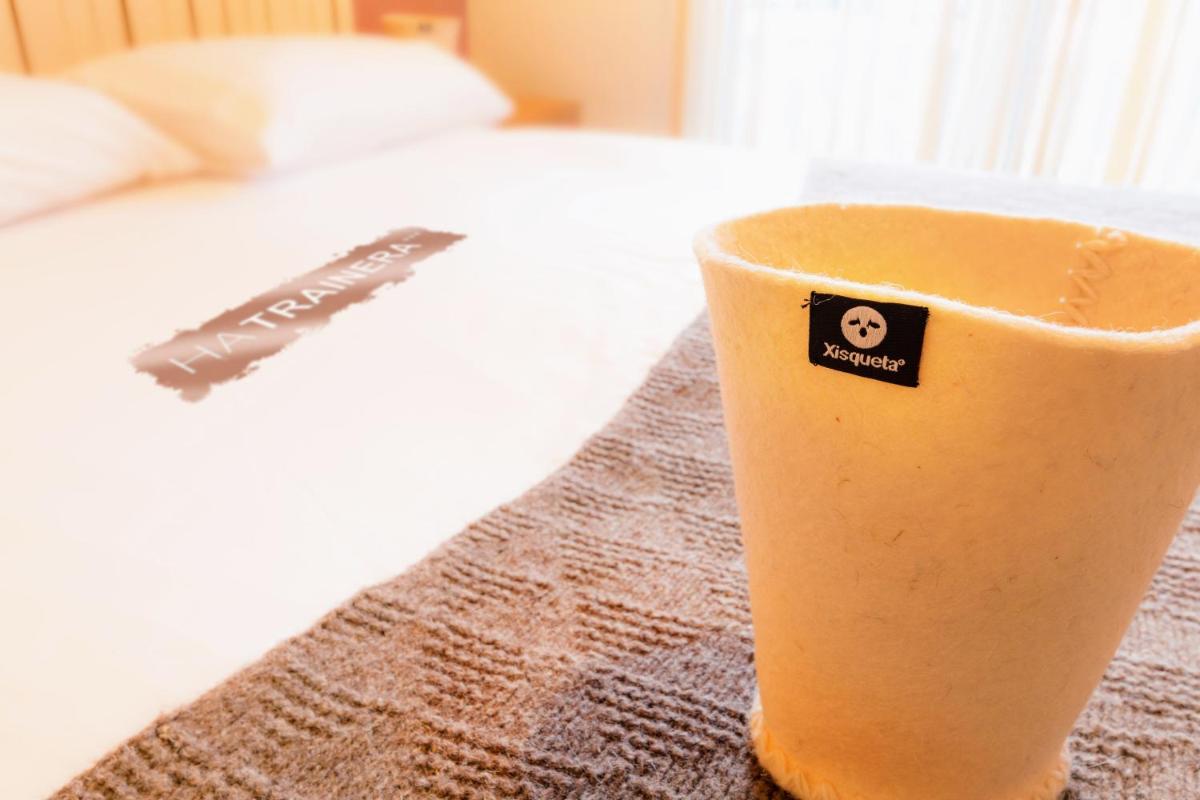 Cama o camas de una habitación en Aparthotel Trainera