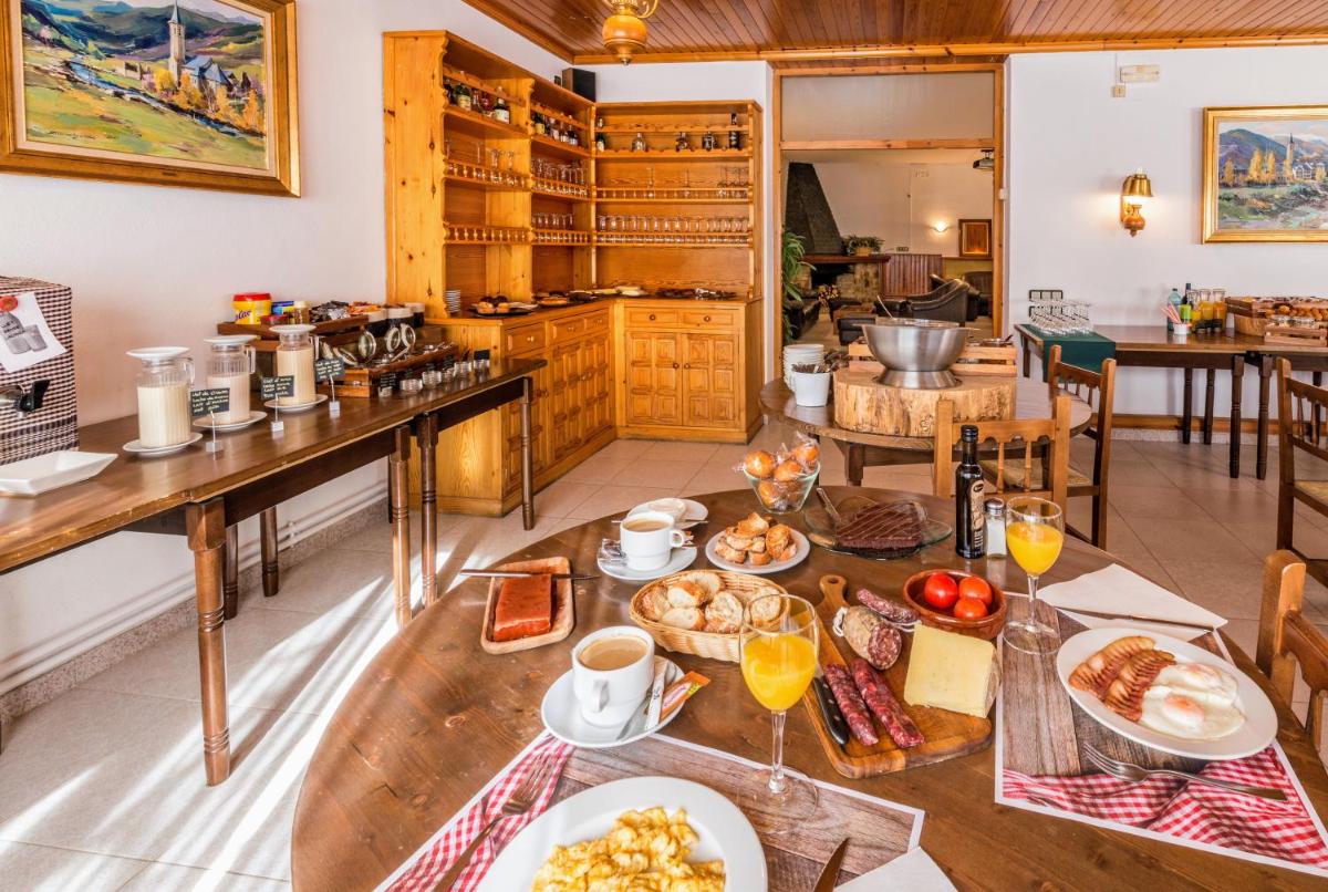 Comida en o cerca de este apartahotel