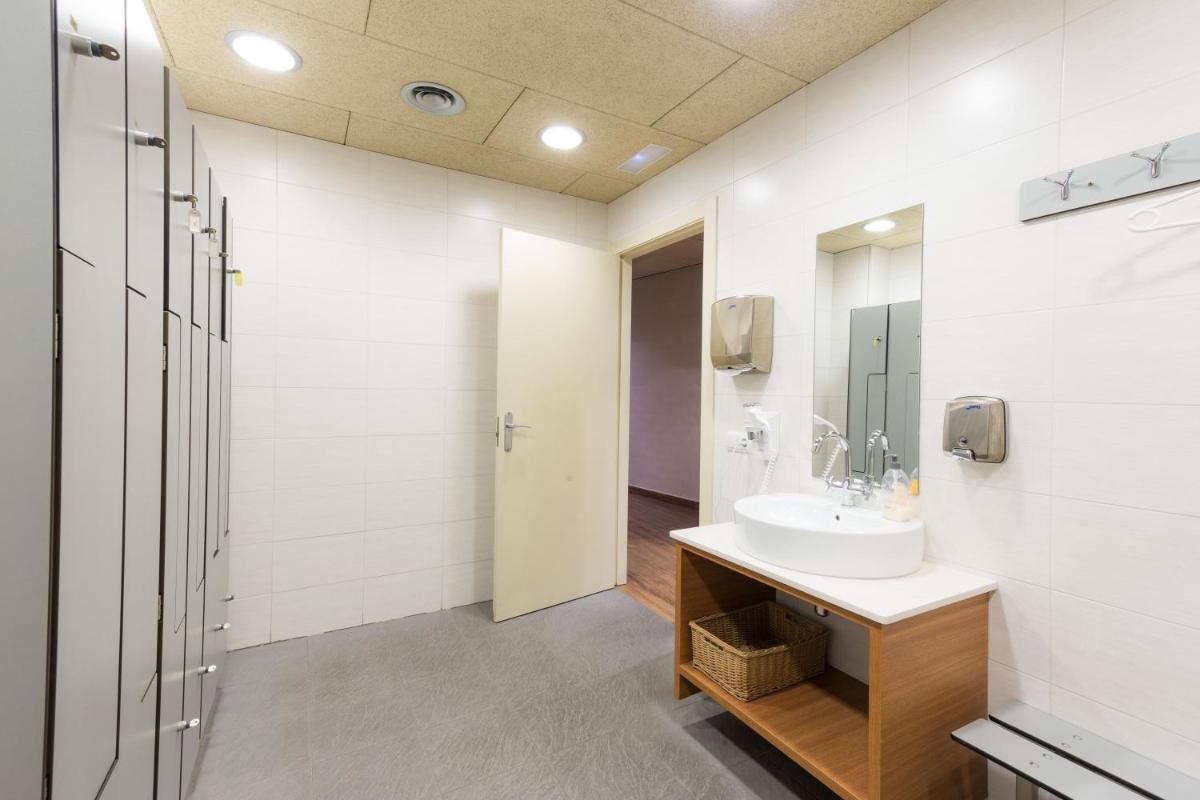 Un baño de Aparthotel Trainera