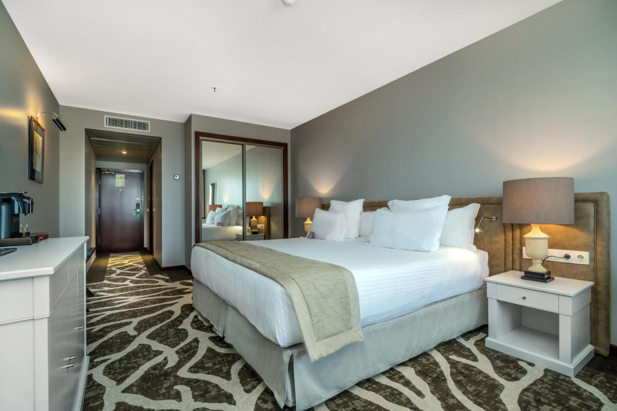 Uma cama ou camas num quarto em Holiday Inn Porto Gaia by IHG