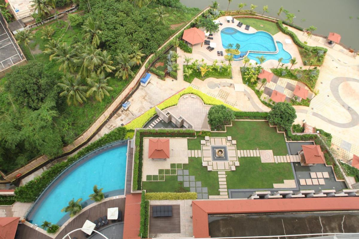 an aerial view of a resort with a pool at Crowne Plaza Kochi by IHG in Cochin