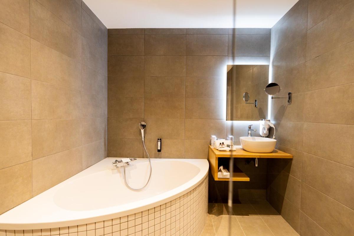 Salle de bains dans l'établissement Fac & Spera -Hôtel & Spa