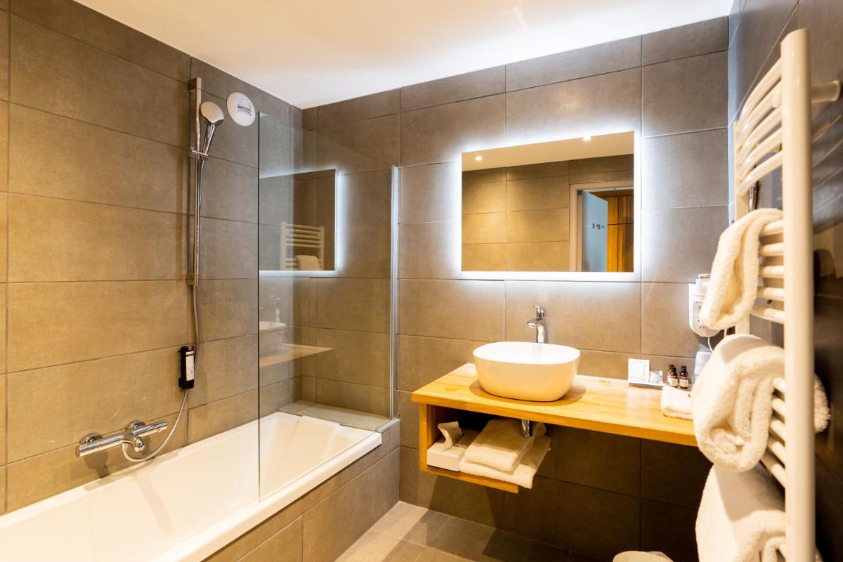 Salle de bains dans l'établissement Fac & Spera -Hôtel & Spa