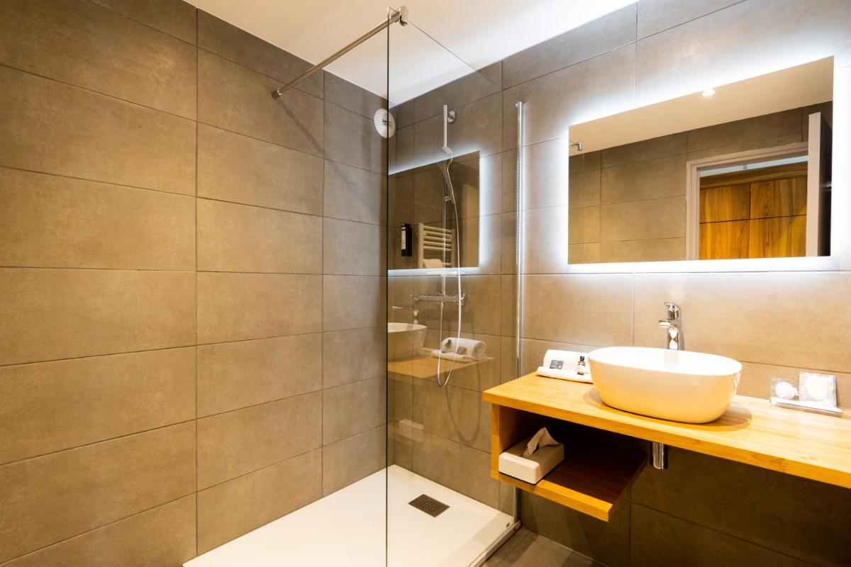 Salle de bains dans l'établissement Fac & Spera -Hôtel & Spa