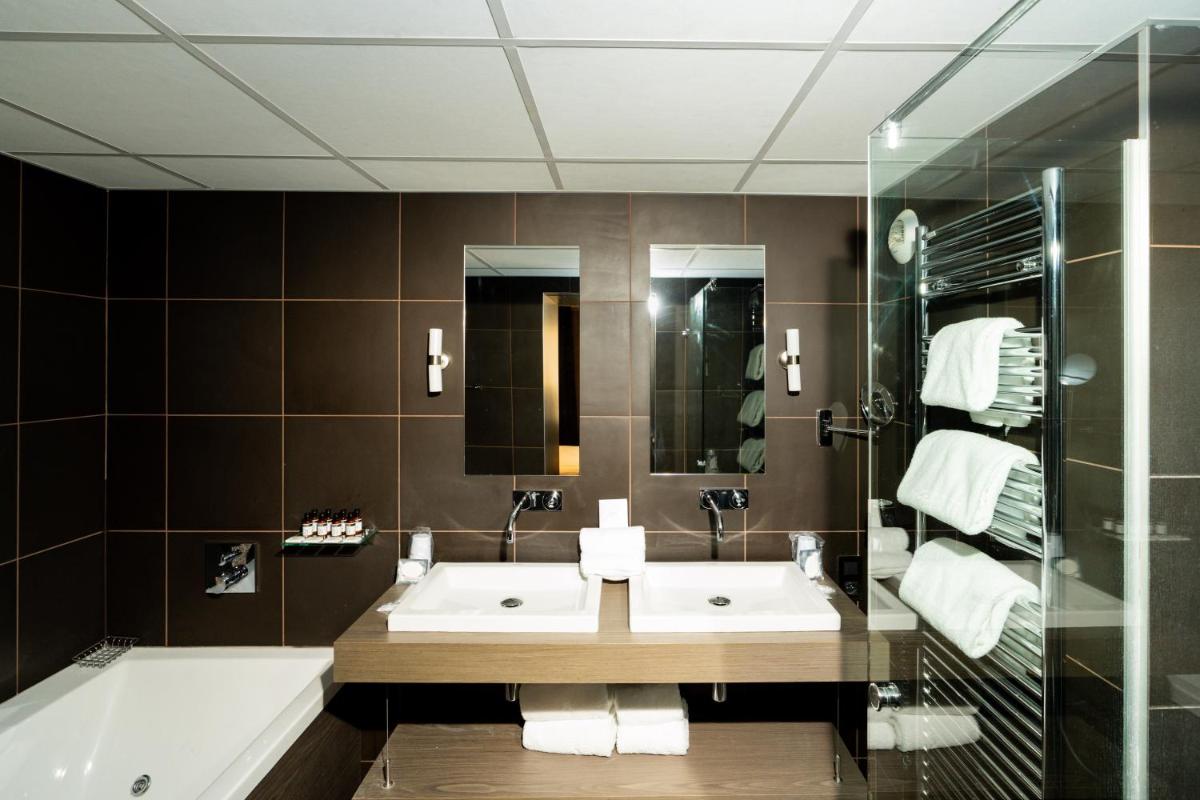 Salle de bains dans l'établissement Fac & Spera -Hôtel & Spa