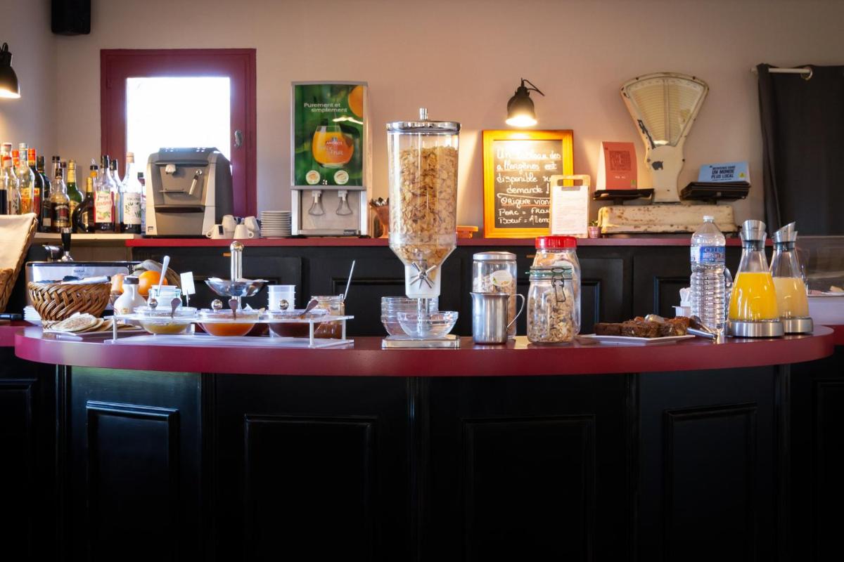 Boissons dans l'établissement Logis Hotel Le Nuage