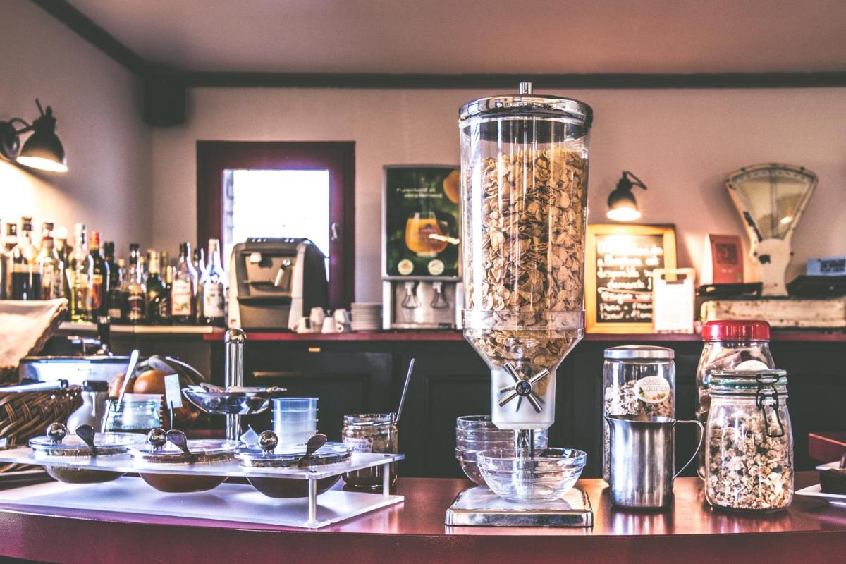 Boissons dans l'établissement Logis Hotel Le Nuage
