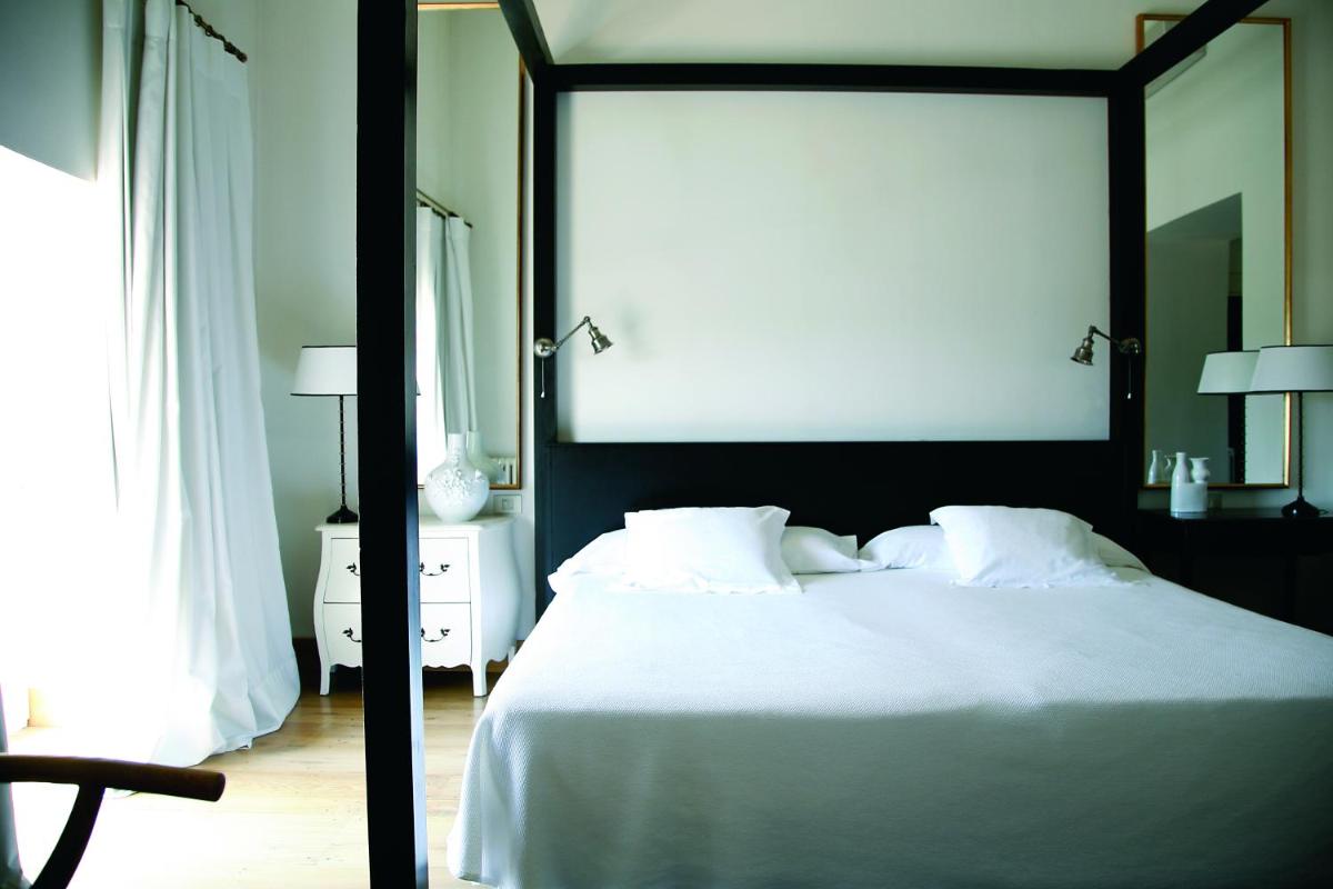 Cama o camas de una habitación en Hotel La Malcontenta