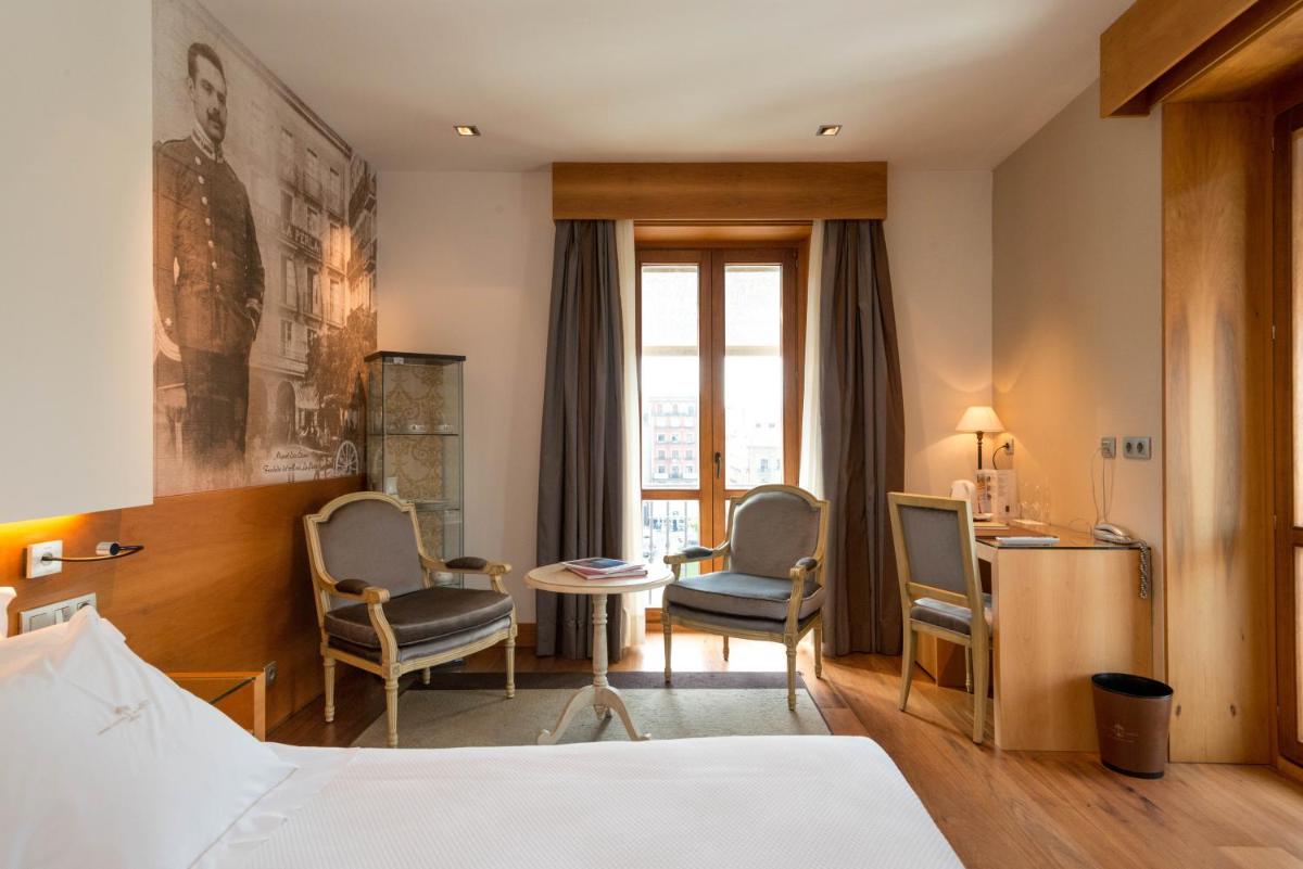 Cama o camas de una habitación en Gran Hotel La Perla