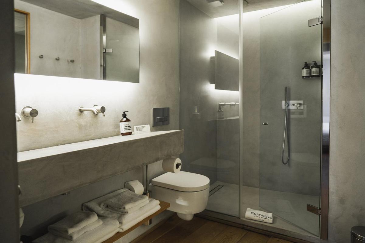 Un baño de Puro Hotel Oasis Urbano