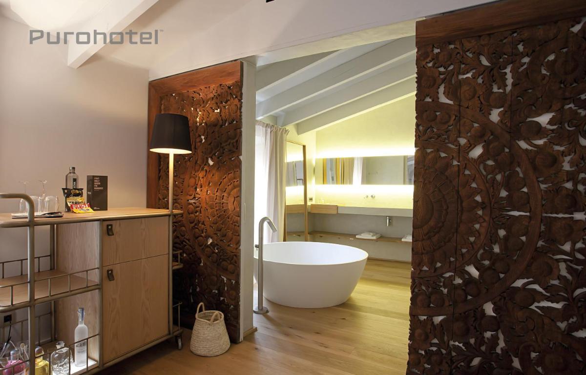 Un baño de Puro Hotel Oasis Urbano
