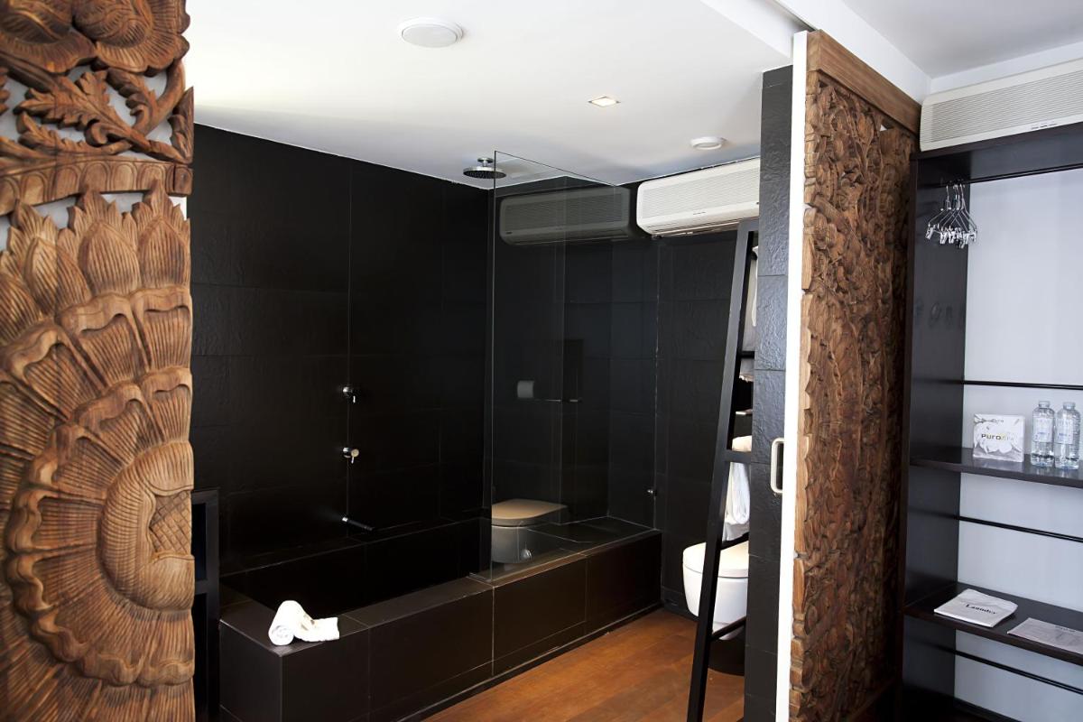 Un baño de Puro Hotel Oasis Urbano
