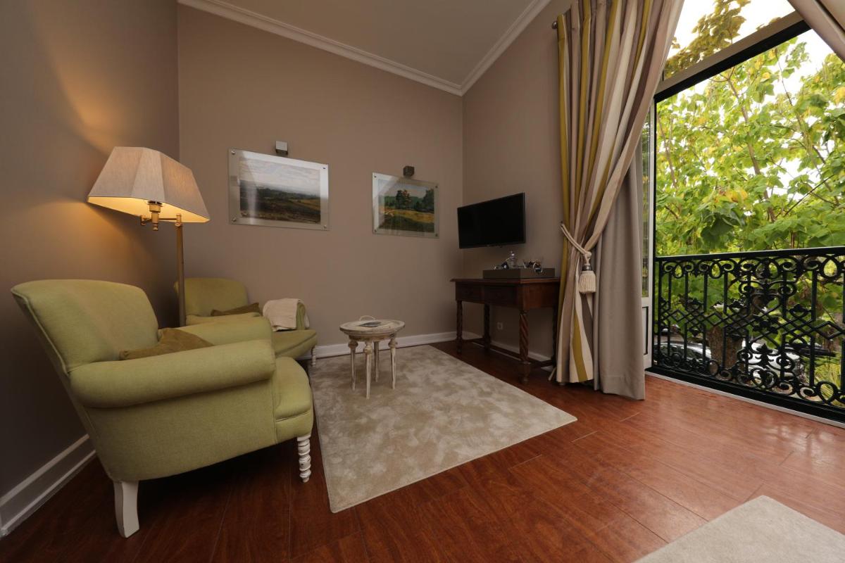 Uma televisão e/ou sistema de entretenimento em Grande Hotel das Caldas da Felgueira