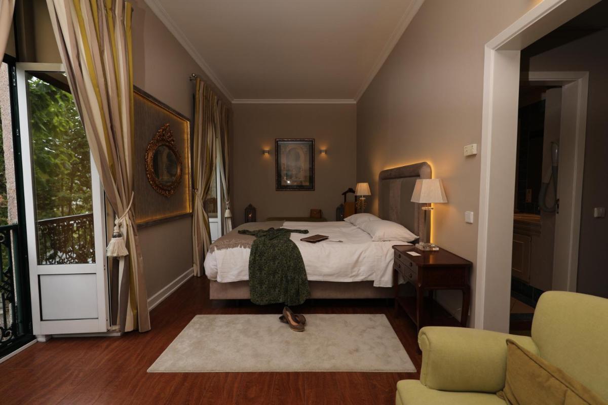 Uma cama ou camas num quarto em Grande Hotel das Caldas da Felgueira