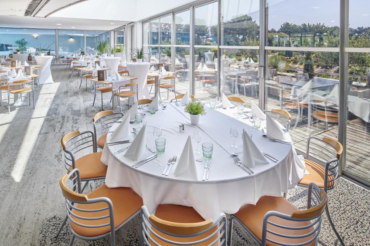 Restaurant ou autre lieu de restauration dans l'établissement Club Vacances Bleues Les Jardins De l'Atlantique