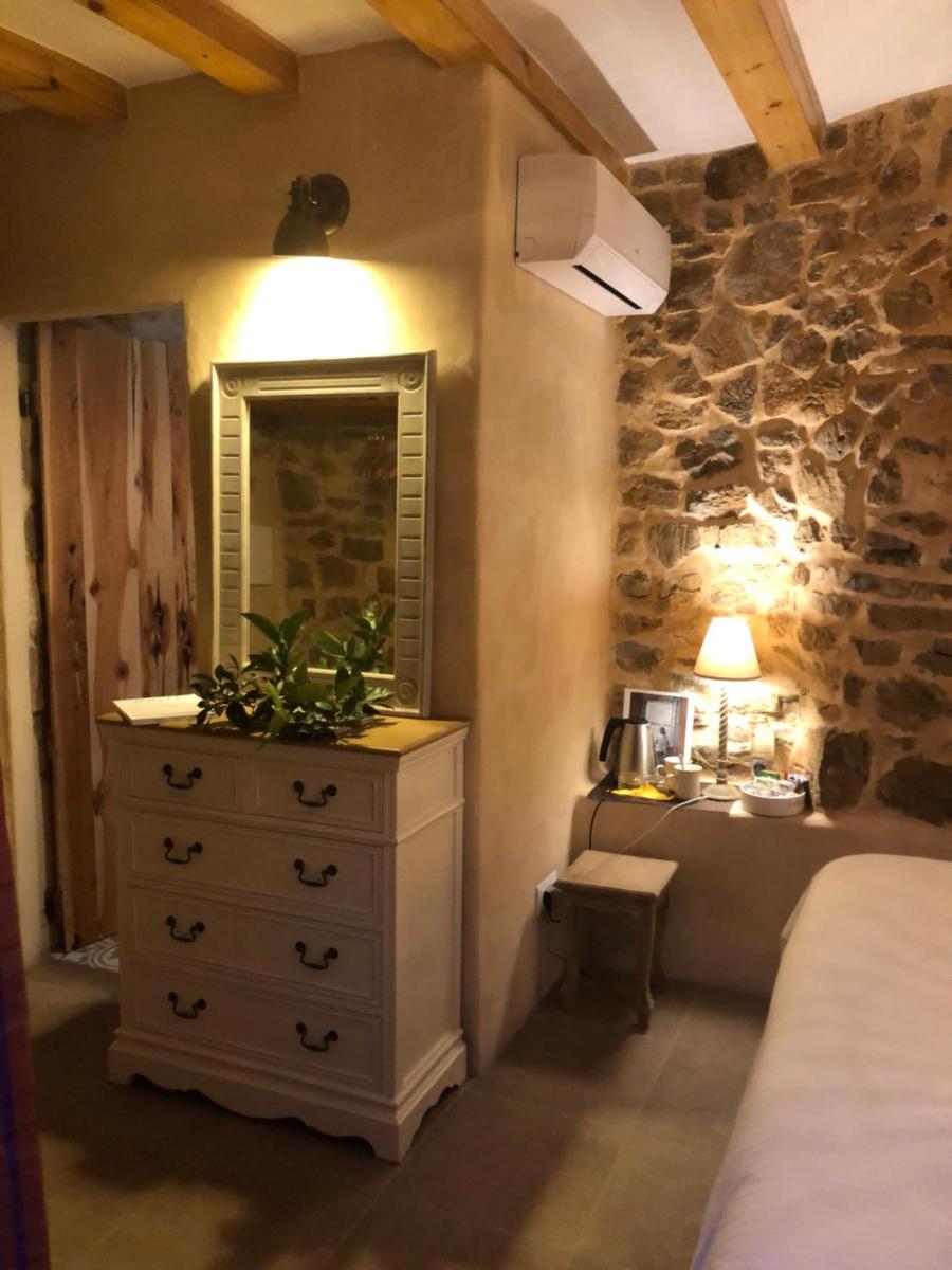 Cama o camas de una habitación en Agroturismo Can Talaias San CArlos