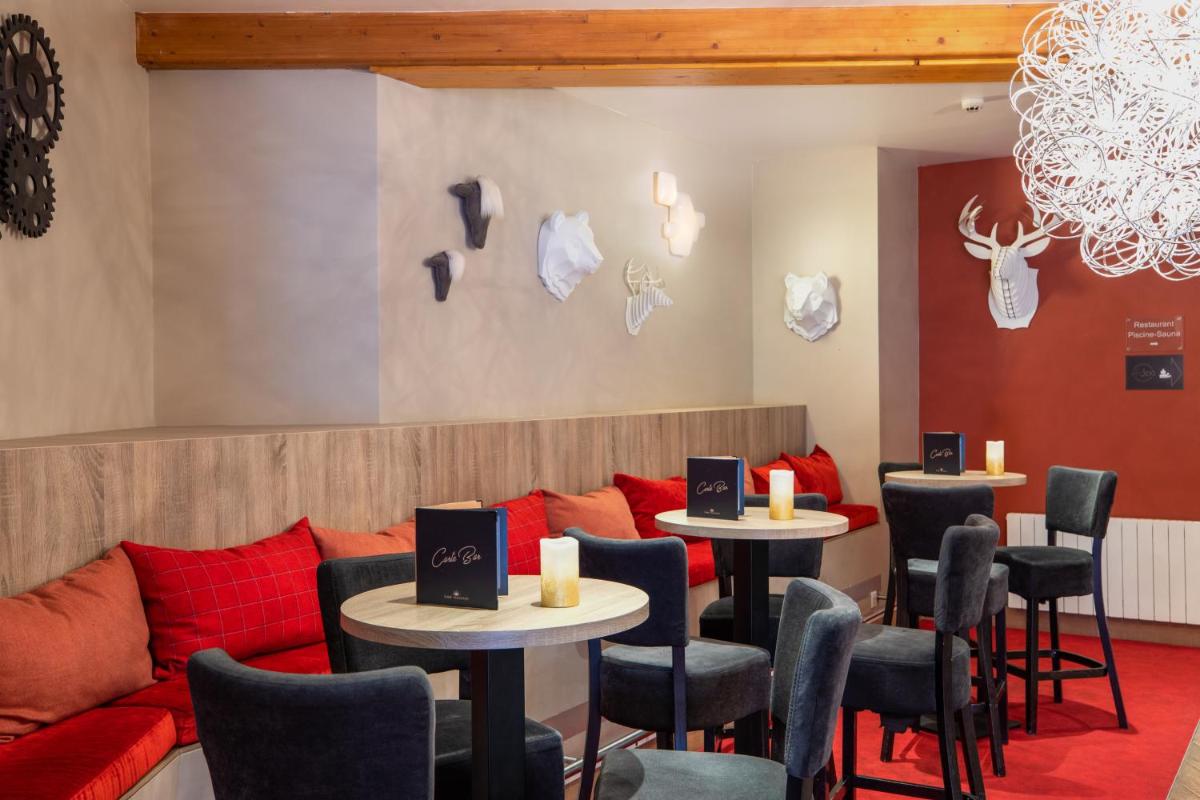 Coin salon dans l'établissement SOWELL HOTELS Le Parc & Spa