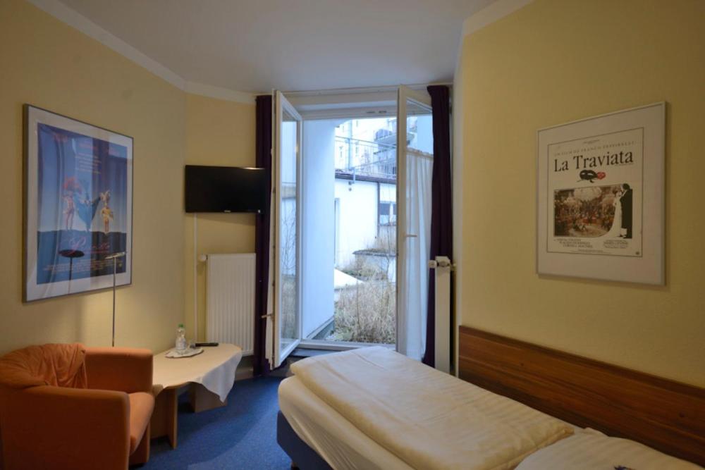 ALPHA Hotel Garni - Housity