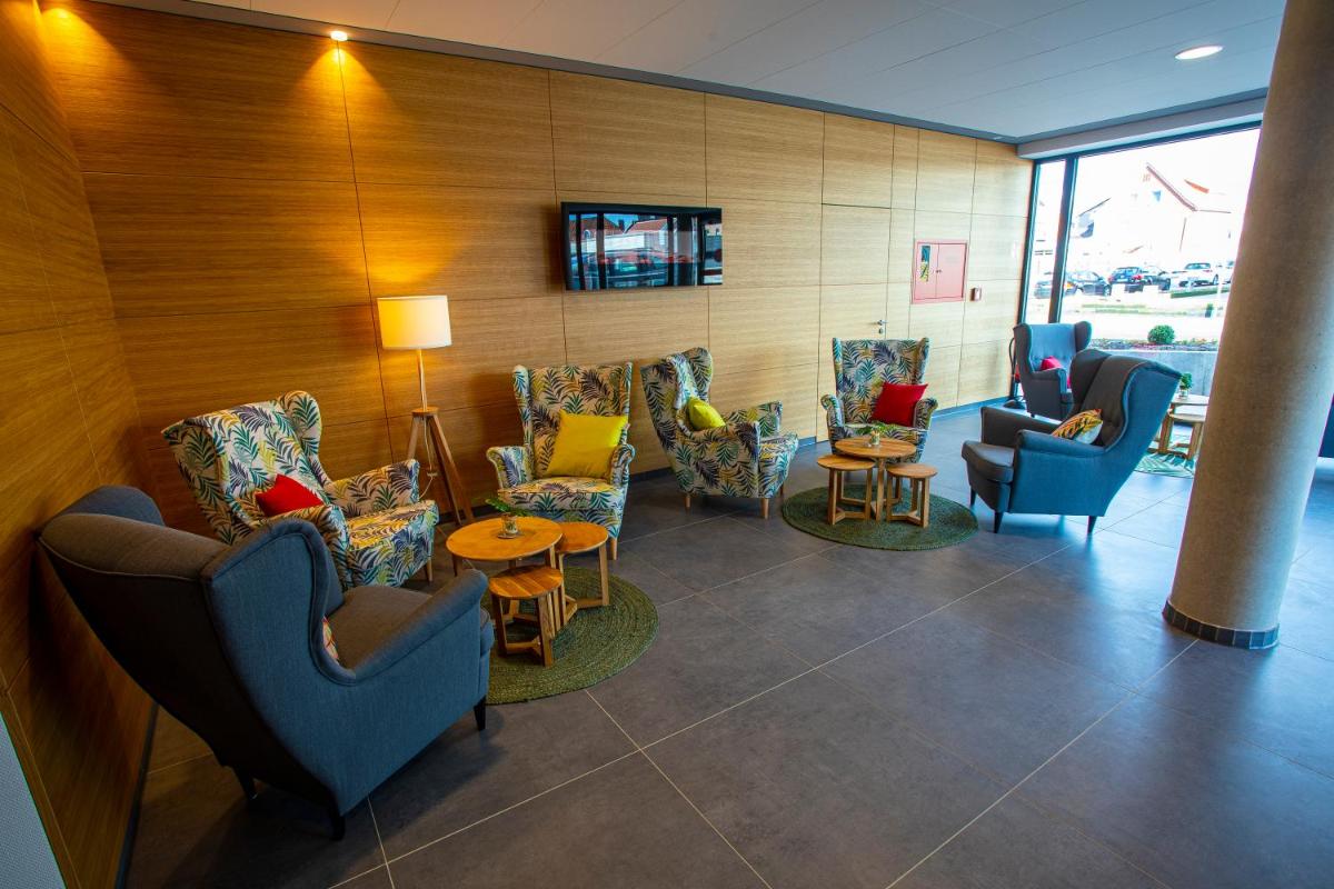 Stadthotel Lohne, Self Check-in & entspannt im Café frühstücken - Housity