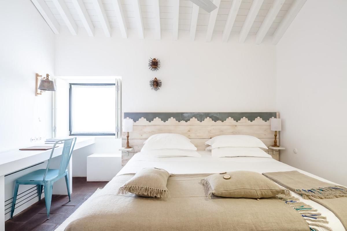 Uma cama ou camas num quarto em Torre de Palma Wine Hotel, Monforte, a Member of Design Hotels